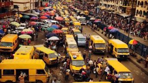 An image of a crowded street with many yellow taxis.